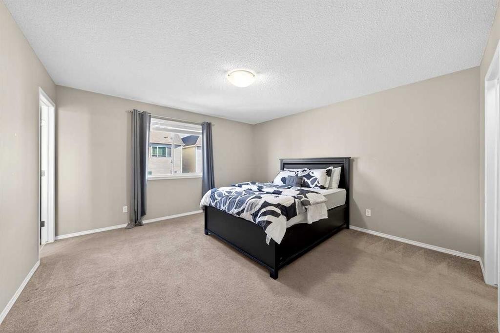 899 Windhaven Close Sw, Airdrie, AB - Indoor Photo Showing Bedroom