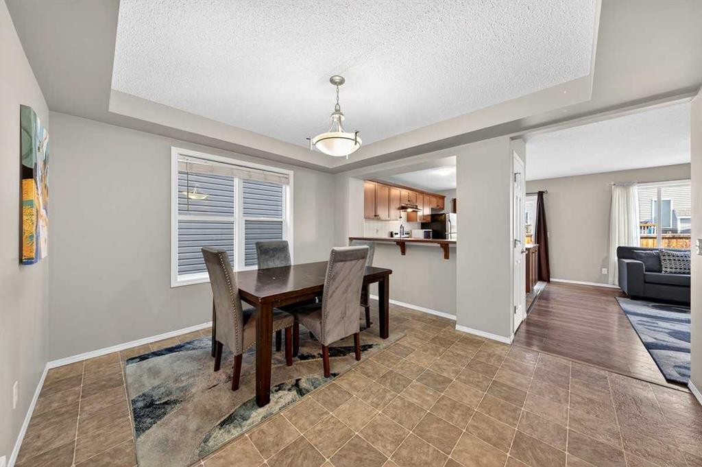 899 Windhaven Close Sw, Airdrie, AB - Indoor Photo Showing Dining Room