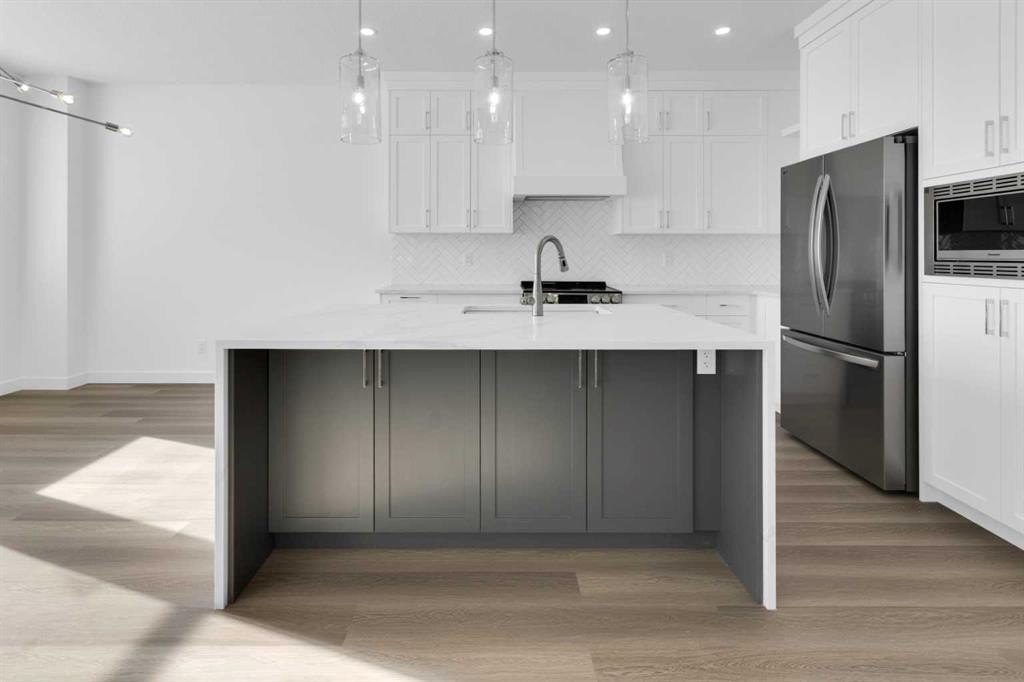 144 Copperhead Road Se, Calgary, AB - Indoor Photo Showing Kitchen With Upgraded Kitchen