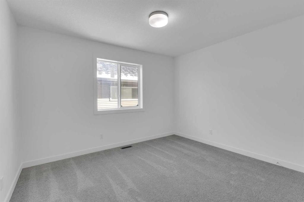 144 Copperhead Road Se, Calgary, AB - Indoor Photo Showing Other Room