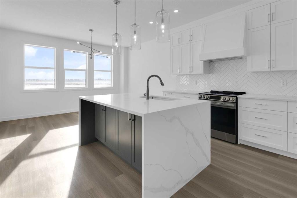 144 Copperhead Road Se, Calgary, AB - Indoor Photo Showing Kitchen With Upgraded Kitchen