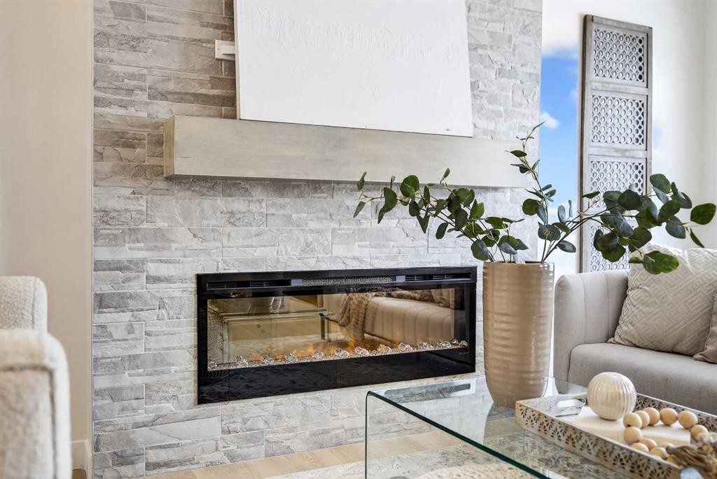 52 Fireside Common Sw, Cochrane, AB - Indoor With Fireplace