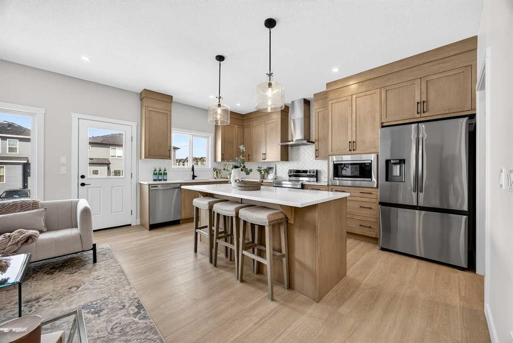 52 Fireside Common Sw, Cochrane, AB - Indoor Photo Showing Kitchen