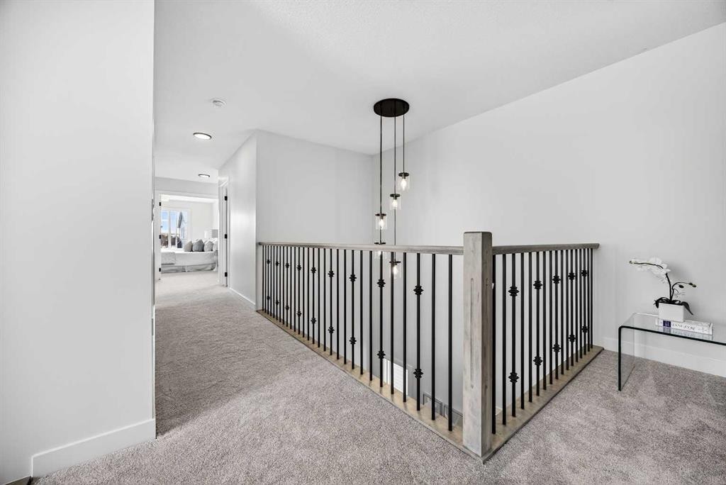 52 Fireside Common Sw, Cochrane, AB - Indoor Photo Showing Other Room