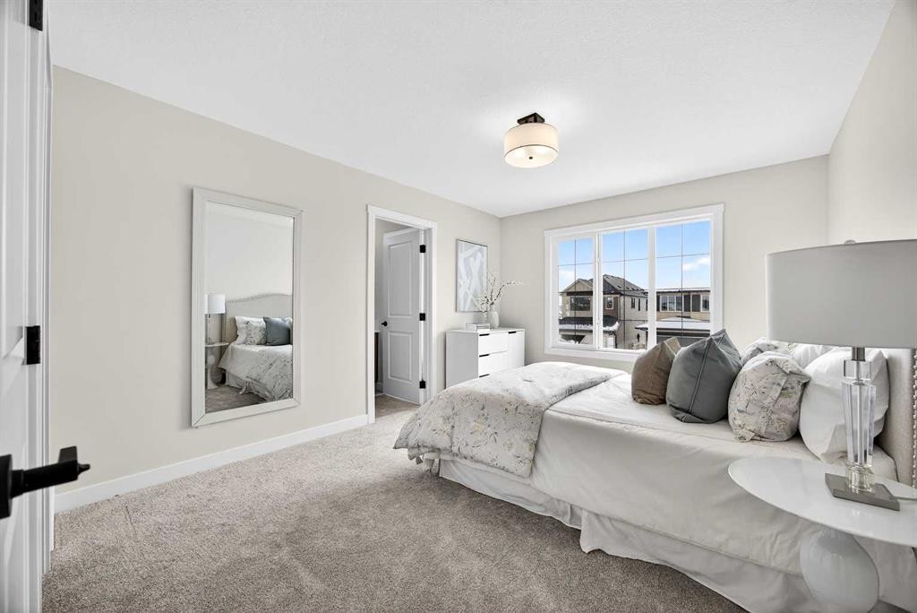 52 Fireside Common Sw, Cochrane, AB - Indoor Photo Showing Bedroom