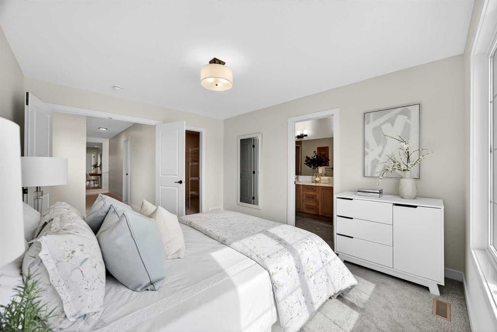 52 Fireside Common Sw, Cochrane, AB - Indoor Photo Showing Bedroom