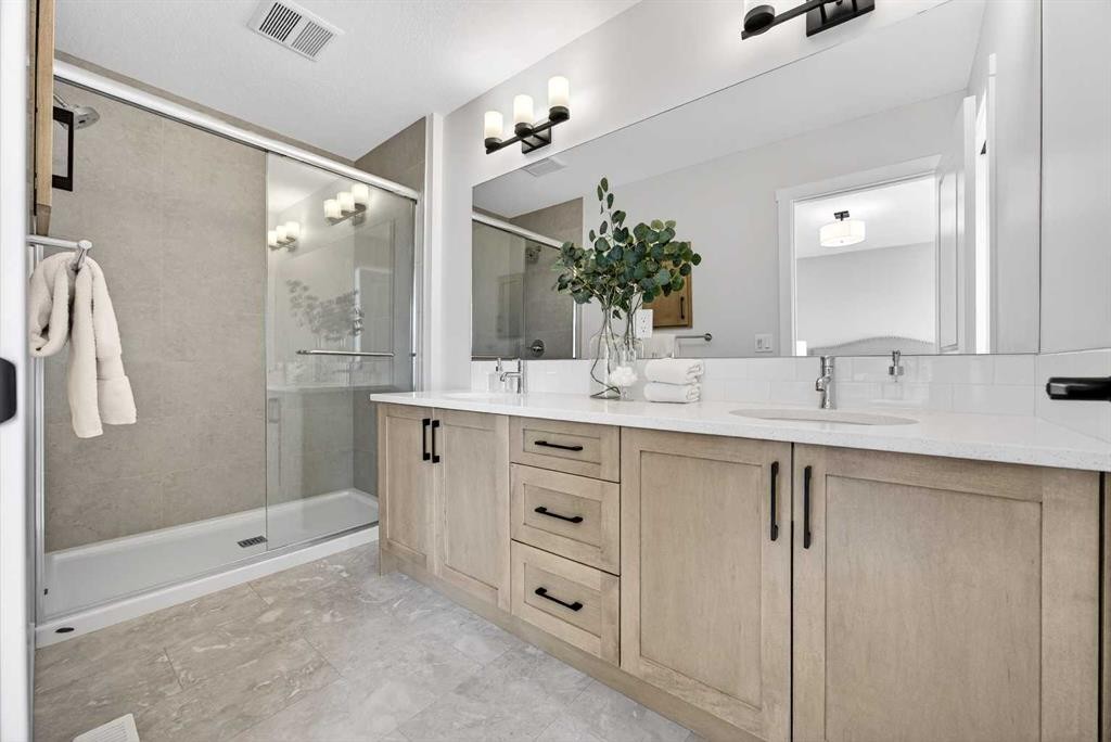 52 Fireside Common Sw, Cochrane, AB - Indoor Photo Showing Bathroom