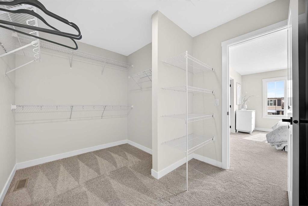 52 Fireside Common Sw, Cochrane, AB - Indoor With Storage