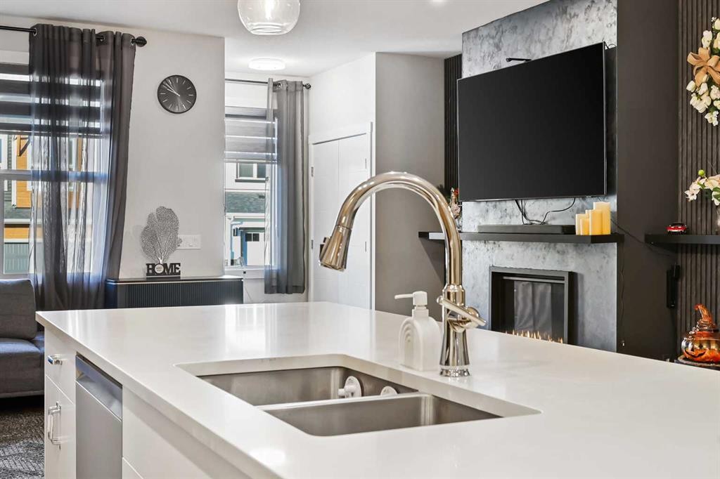 128 Setonstone Gardens Se, Calgary, AB - Indoor Photo Showing Kitchen With Double Sink