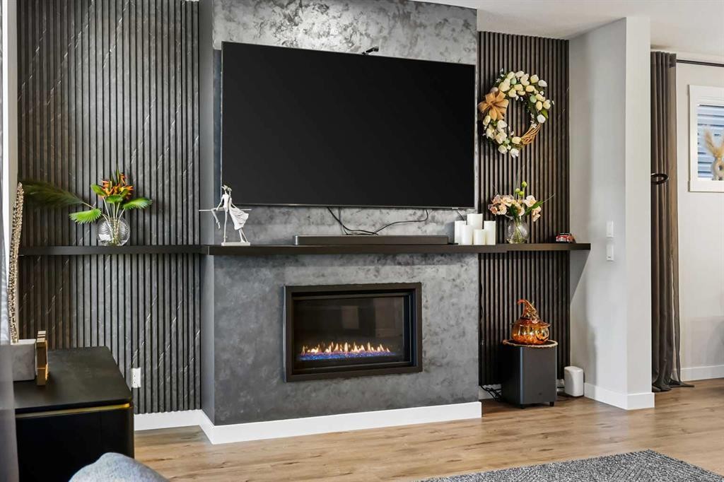 128 Setonstone Gardens Se, Calgary, AB - Indoor Photo Showing Living Room With Fireplace