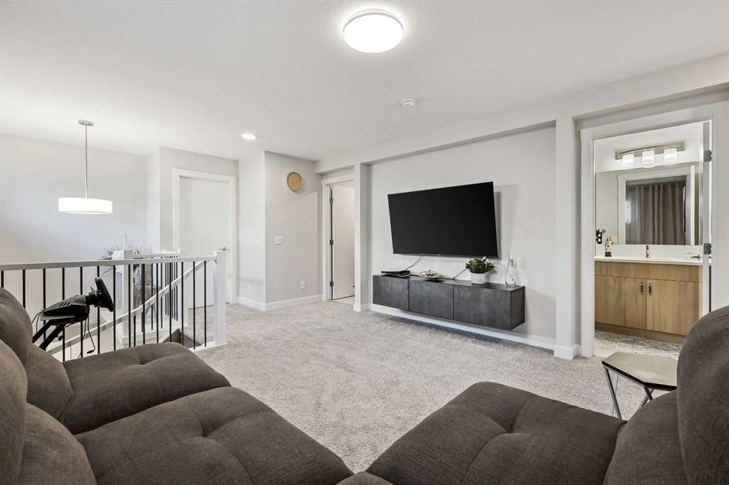 128 Setonstone Gardens Se, Calgary, AB - Indoor Photo Showing Living Room