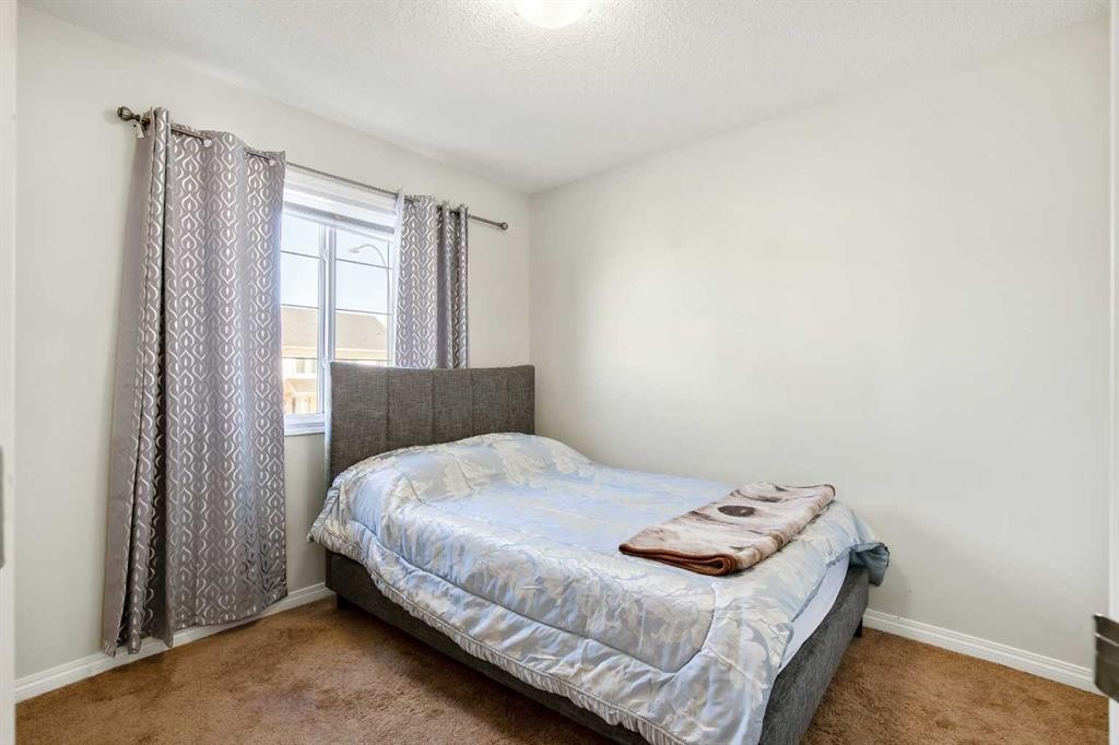 8339 Saddlebrook Drive Ne, Calgary, AB - Indoor Photo Showing Bedroom