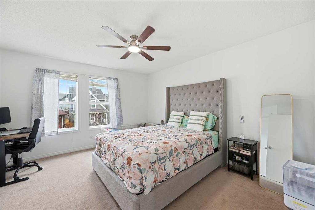 41 New Brighton Green Se, Calgary, AB - Indoor Photo Showing Bedroom