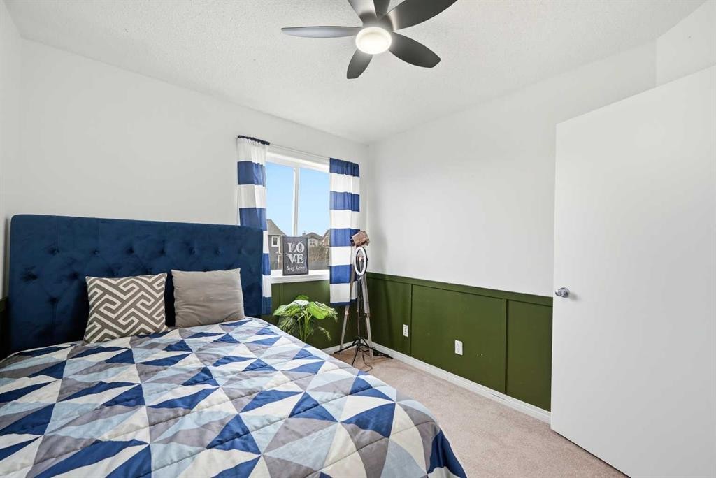 41 New Brighton Green Se, Calgary, AB - Indoor Photo Showing Bedroom