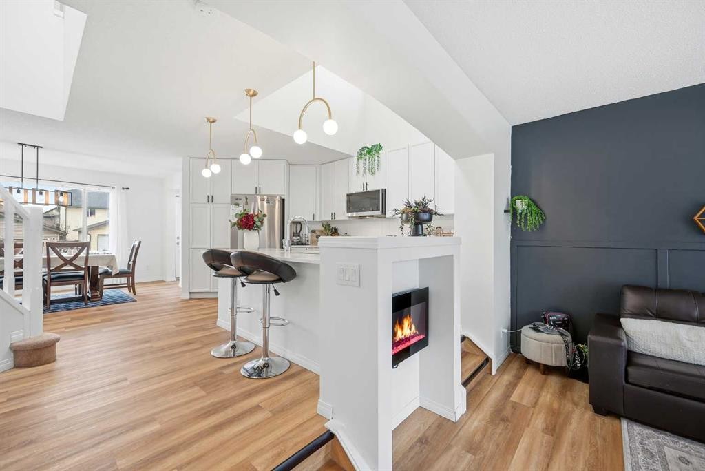41 New Brighton Green Se, Calgary, AB - Indoor With Fireplace