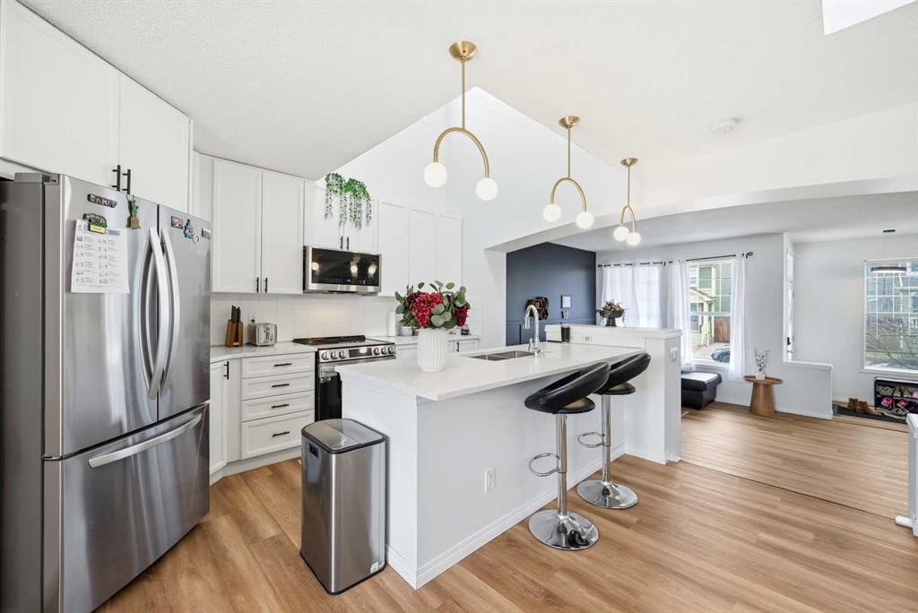 41 New Brighton Green Se, Calgary, AB - Indoor Photo Showing Kitchen With Upgraded Kitchen