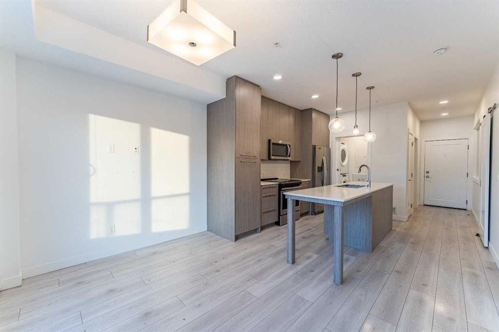 2205-76 Cornerstone Passage Ne, Calgary, AB - Indoor Photo Showing Kitchen With Stainless Steel Kitchen With Upgraded Kitchen