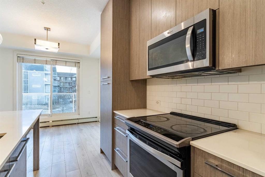 2205-76 Cornerstone Passage Ne, Calgary, AB - Indoor Photo Showing Kitchen