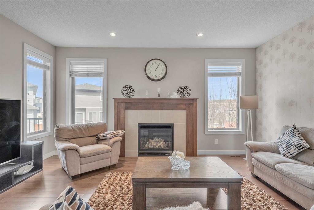 145 Walden Park Se, Calgary, AB - Indoor Photo Showing Living Room With Fireplace