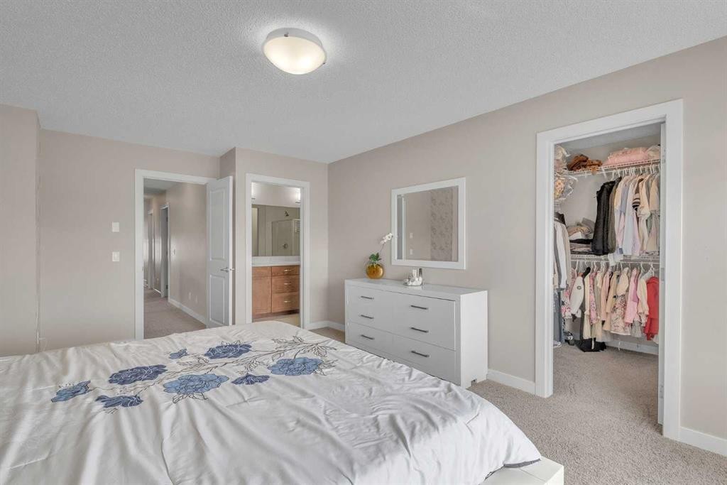145 Walden Park Se, Calgary, AB - Indoor Photo Showing Bedroom