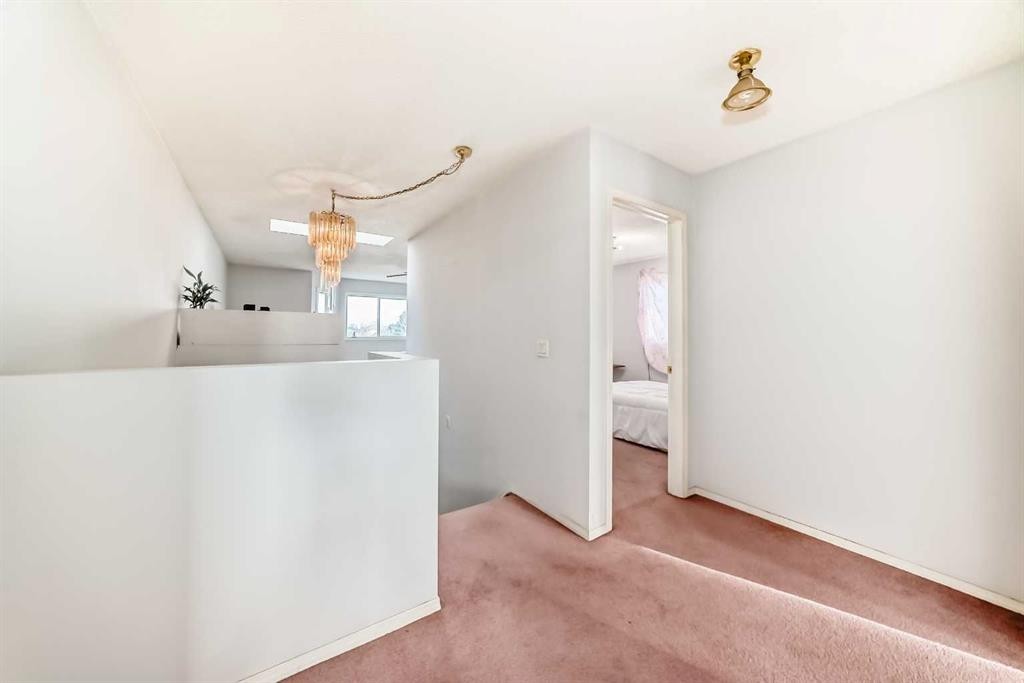 215 Appleglen Park Se, Calgary, AB - Indoor Photo Showing Other Room