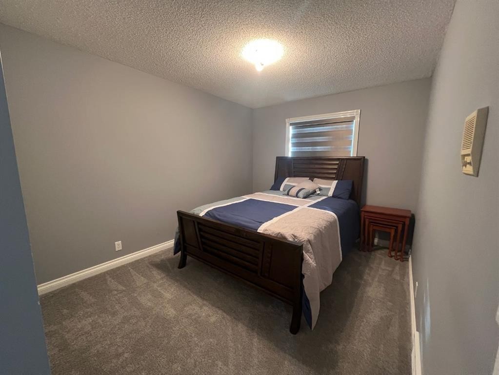 200 Hawkbury Close Nw, Calgary, AB - Indoor Photo Showing Bedroom