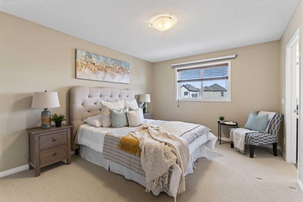 250 Silverado Plains Close Sw, Calgary, AB - Indoor Photo Showing Bedroom
