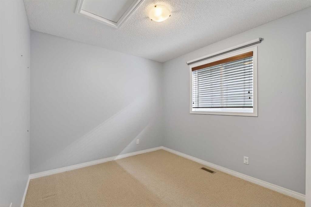250 Silverado Plains Close Sw, Calgary, AB - Indoor Photo Showing Other Room