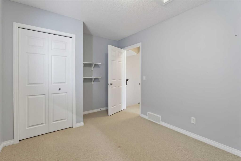250 Silverado Plains Close Sw, Calgary, AB - Indoor Photo Showing Other Room