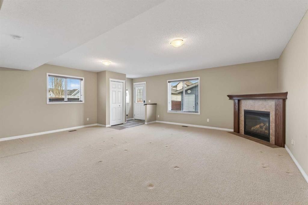 250 Silverado Plains Close Sw, Calgary, AB - Indoor With Fireplace