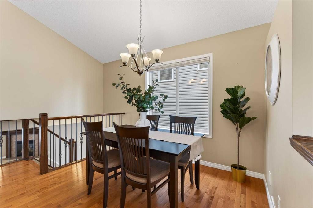 250 Silverado Plains Close Sw, Calgary, AB - Indoor Photo Showing Dining Room