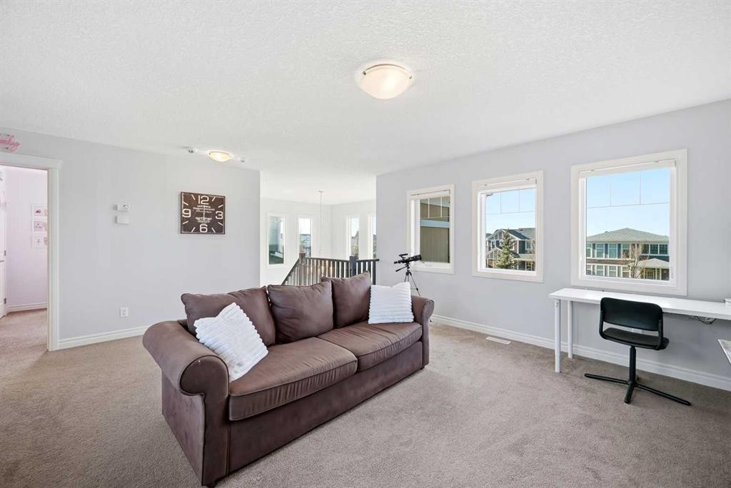 8 Redstone Passage Ne, Calgary, AB - Indoor Photo Showing Living Room