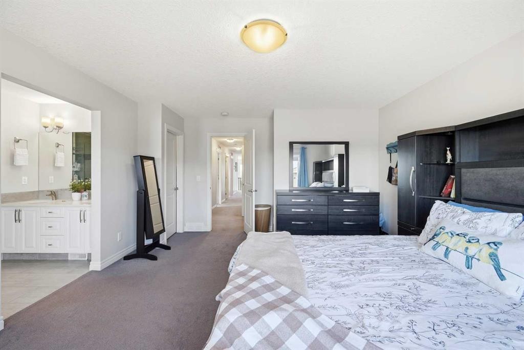 8 Redstone Passage Ne, Calgary, AB - Indoor Photo Showing Bedroom