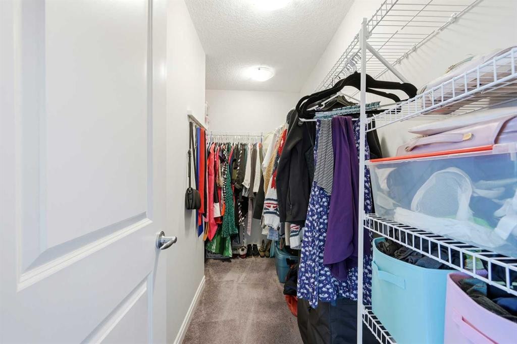 8 Redstone Passage Ne, Calgary, AB - Indoor With Storage