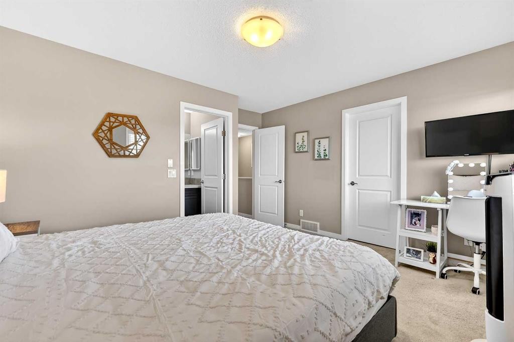90 Walden Crescent Se, Calgary, AB - Indoor Photo Showing Bedroom