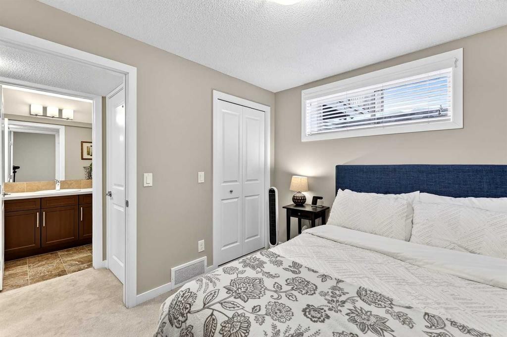 90 Walden Crescent Se, Calgary, AB - Indoor Photo Showing Bedroom