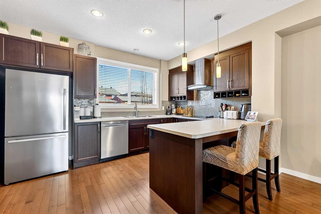 90 Walden Crescent Se, Calgary, AB - Indoor Photo Showing Kitchen With Stainless Steel Kitchen