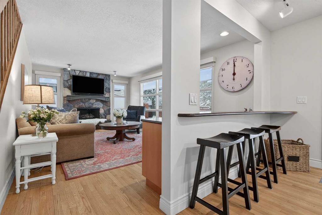 6913 Leaside Drive Sw, Calgary, AB - Indoor With Fireplace