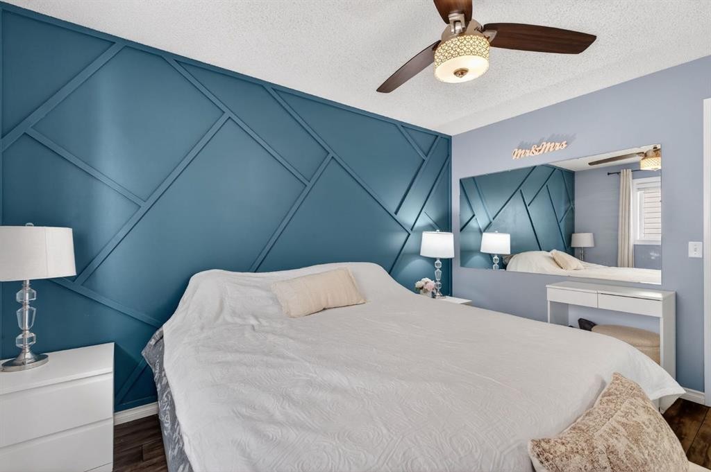 108 Cimarron Grove Circle, Okotoks, AB - Indoor Photo Showing Bedroom