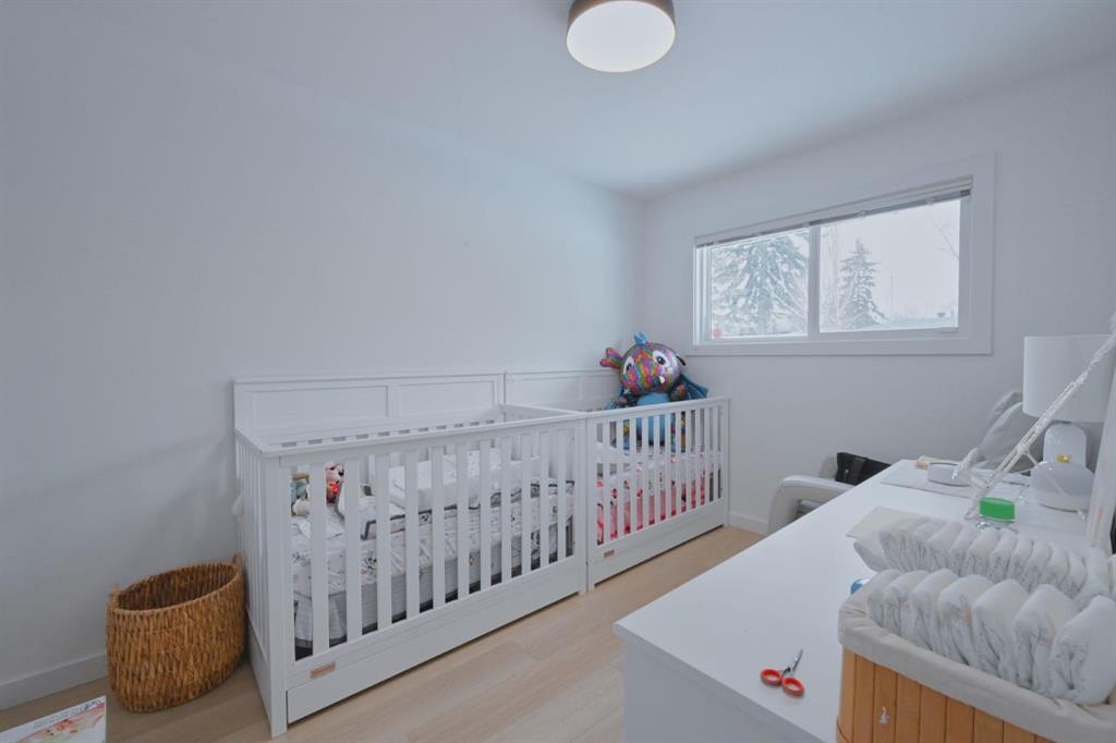 7611 Fleetwood Drive Se, Calgary, AB - Indoor Photo Showing Bedroom