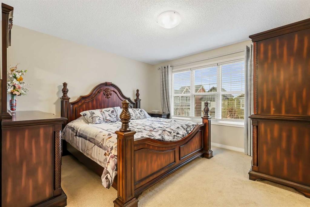 143 Masters Link Se, Calgary, AB - Indoor Photo Showing Bedroom