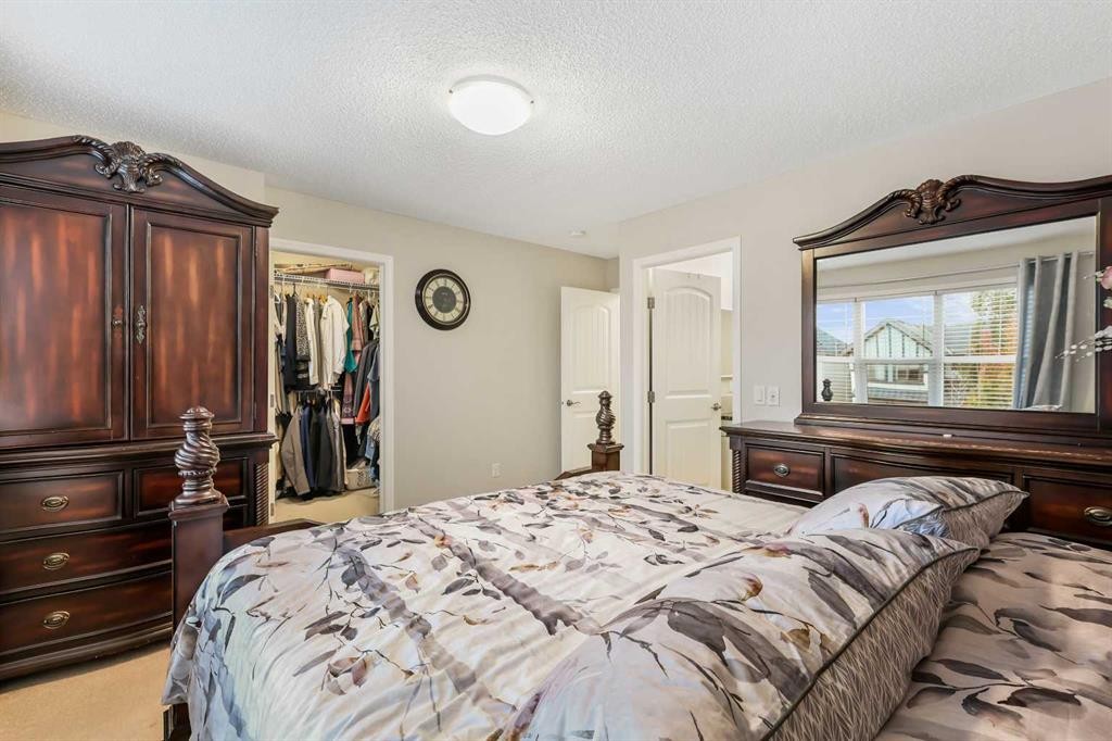 143 Masters Link Se, Calgary, AB - Indoor Photo Showing Bedroom