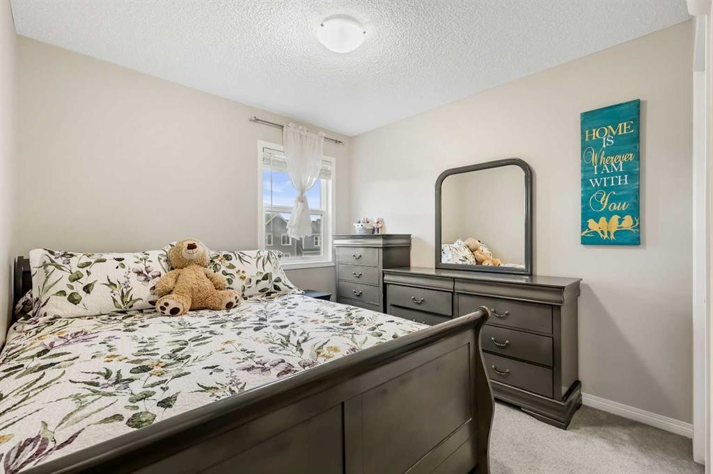 143 Masters Link Se, Calgary, AB - Indoor Photo Showing Bedroom
