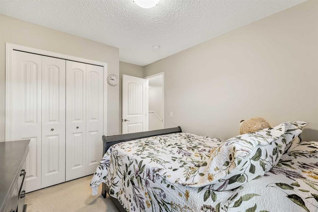 143 Masters Link Se, Calgary, AB - Indoor Photo Showing Bedroom