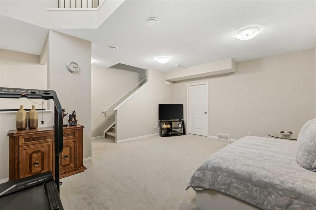 143 Masters Link Se, Calgary, AB - Indoor Photo Showing Bedroom