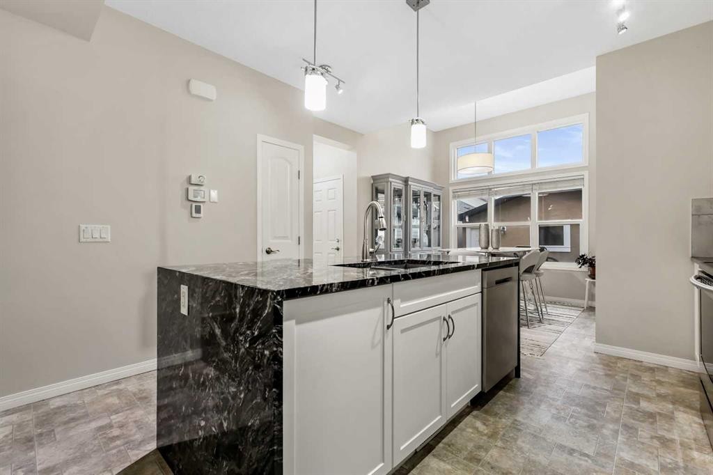 143 Masters Link Se, Calgary, AB - Indoor Photo Showing Kitchen With Upgraded Kitchen