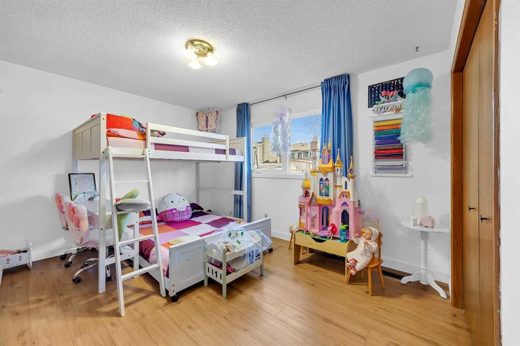 874 Riverbend Drive Se, Calgary, AB - Indoor Photo Showing Bedroom