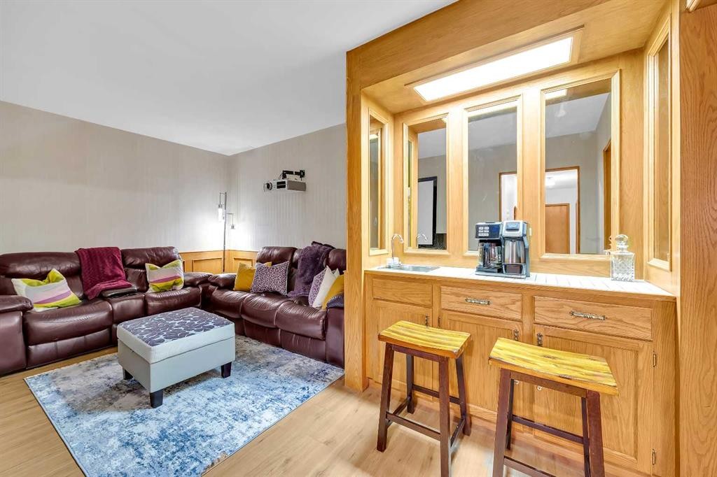 874 Riverbend Drive Se, Calgary, AB - Indoor Photo Showing Living Room