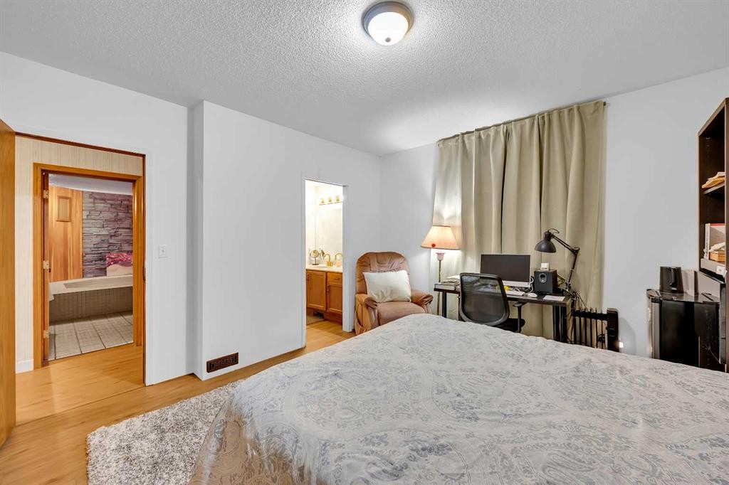 874 Riverbend Drive Se, Calgary, AB - Indoor Photo Showing Bedroom