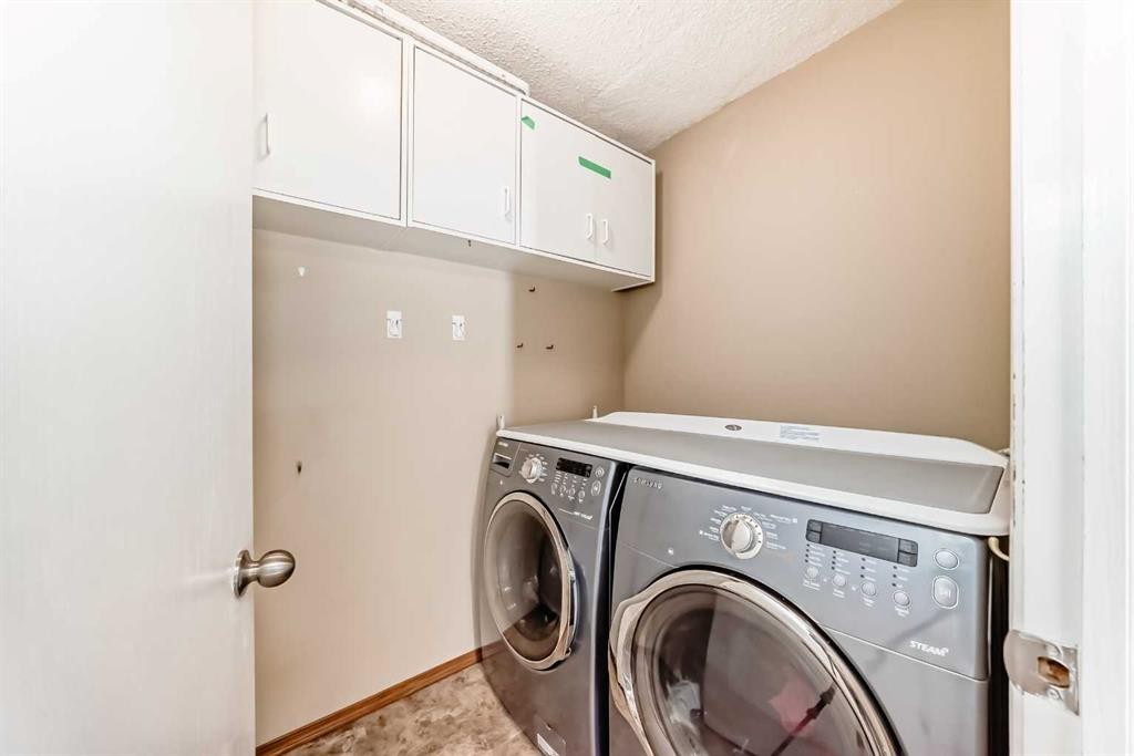 151 Macewan Park Circle Nw, Calgary, AB - Indoor Photo Showing Laundry Room